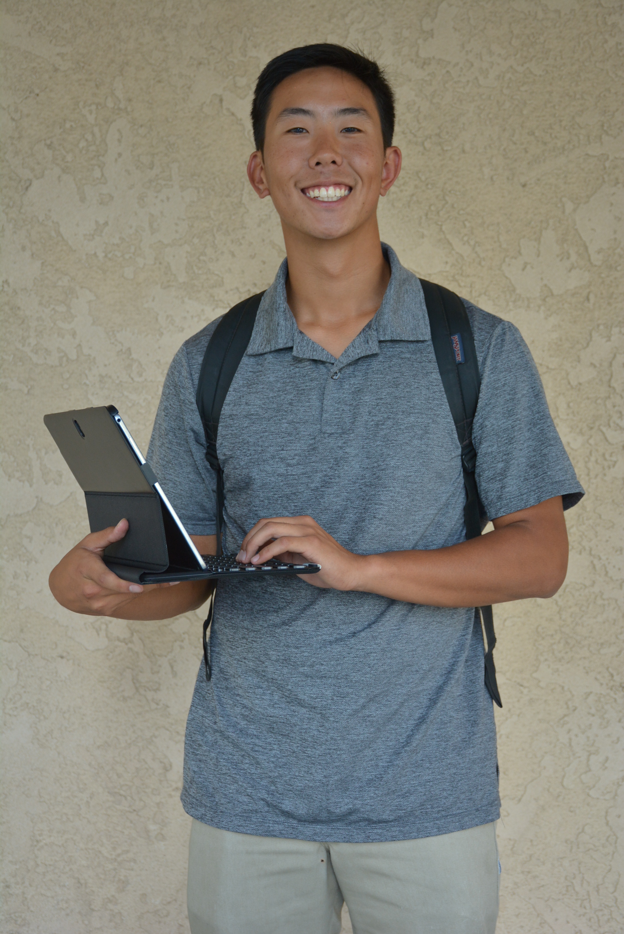Student Smiling with laptop