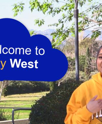 Student with "Welcome to my West" text