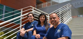 Three Health Students on Stairs