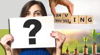 woman holding sign with "?"