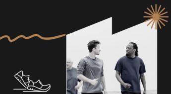 two men walking and talking