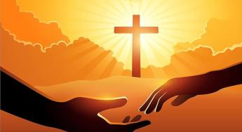 A sun lit Christian cross and hands touching