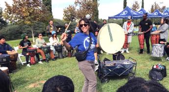 Person holding drums