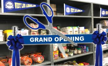 scissors cutting a "Grand Opening" ribbon