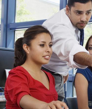 Teacher Explaining in the Computer Lab