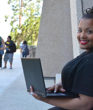 Female Student with Computer