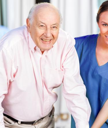 Nurse Caring for an Older Adult