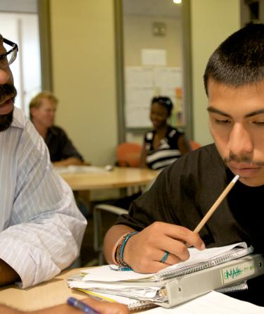 Tutor Teaching His Student