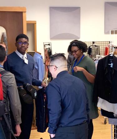 students selecting clothes in WLAC Wardrobe