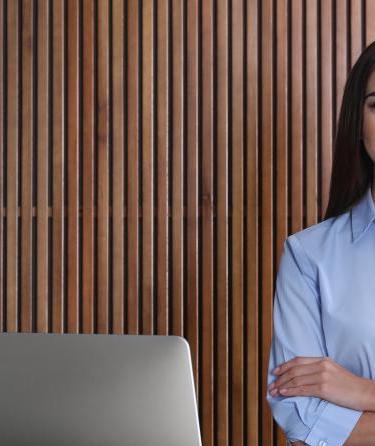 woman working at a hotel front desk