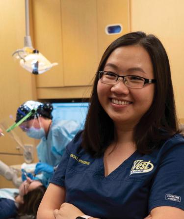 dental hygienist in clinical setting