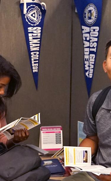 Students Reading a Brochure
