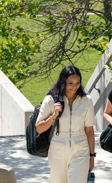 student walking in Lieffer Mall