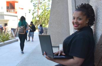 Female Student with Computer