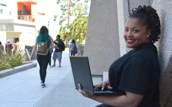 Female Student with Computer