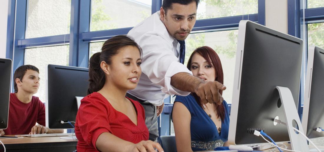 Teacher Explaining in the Computer Lab