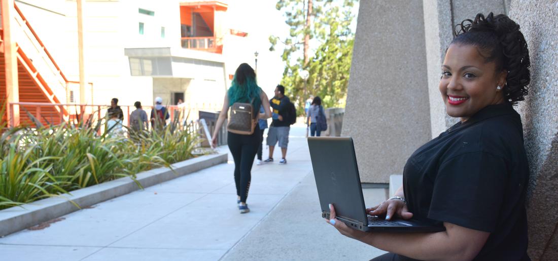 Female Student with Computer