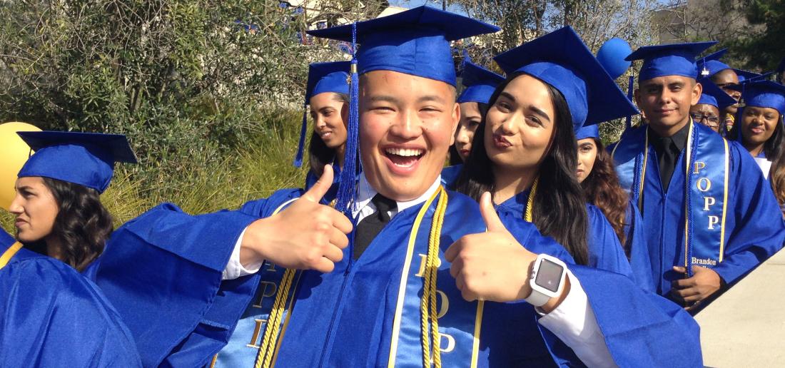 Male Student Smilling at Graduation