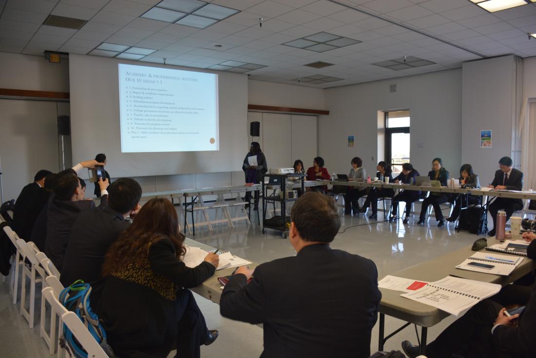 Group of People at a Meeting