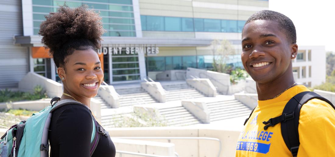 two students smiling