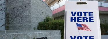 Vote Here sign in front of Fine Arts Building